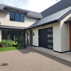 new modern home with black gutters