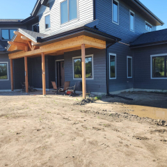 A residential property in Rockford, MN, featuring newly installed seamless gutters by Call The Gutter Guys, enhancing the home's exterior and functionality