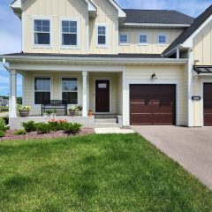 White seamless gutters on front of home in Independence MN