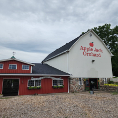 Apple Jack Orchard in Delano, MN, featuring newly installed seamless gutters by Call The Gutter Guys for optimal water management and protection