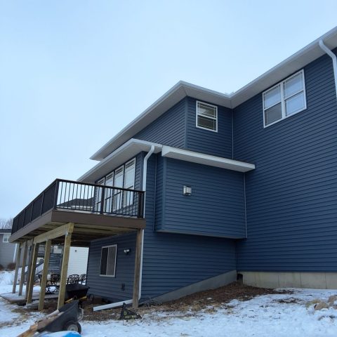 White seamless gutters installed by Call The Gutter Guys in Rockford Minnesota in 2026